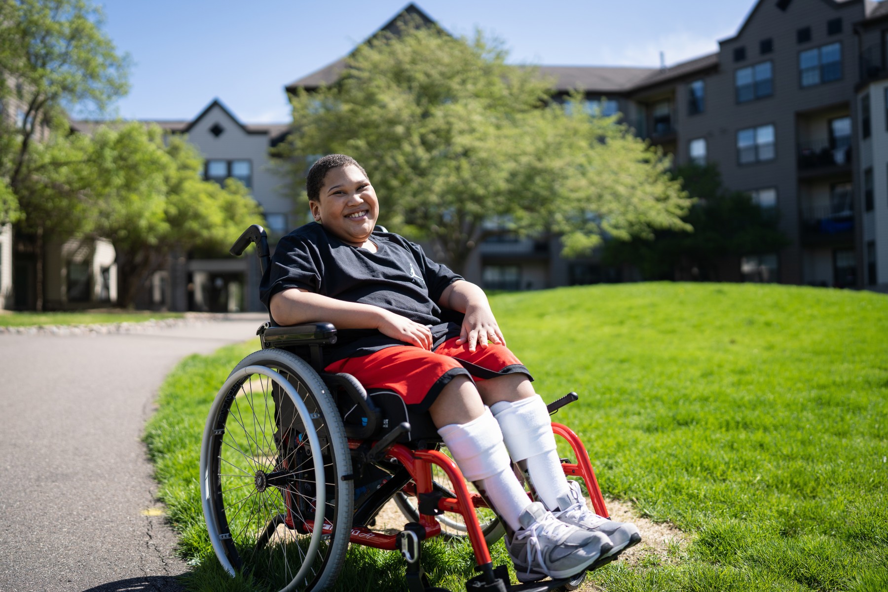 Gillette Children's patient, Michael Holley in his wheel chair