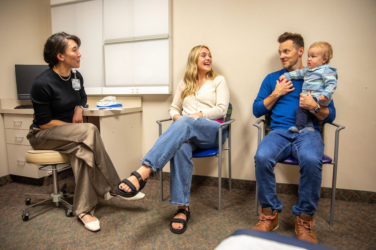 Gillette craniofacial and plastic surgeon, Jo Barta, MD, meets with Abigail, Zak and Ekler Batcher to discuss the plan for Eker's cleft palate repair surgery.