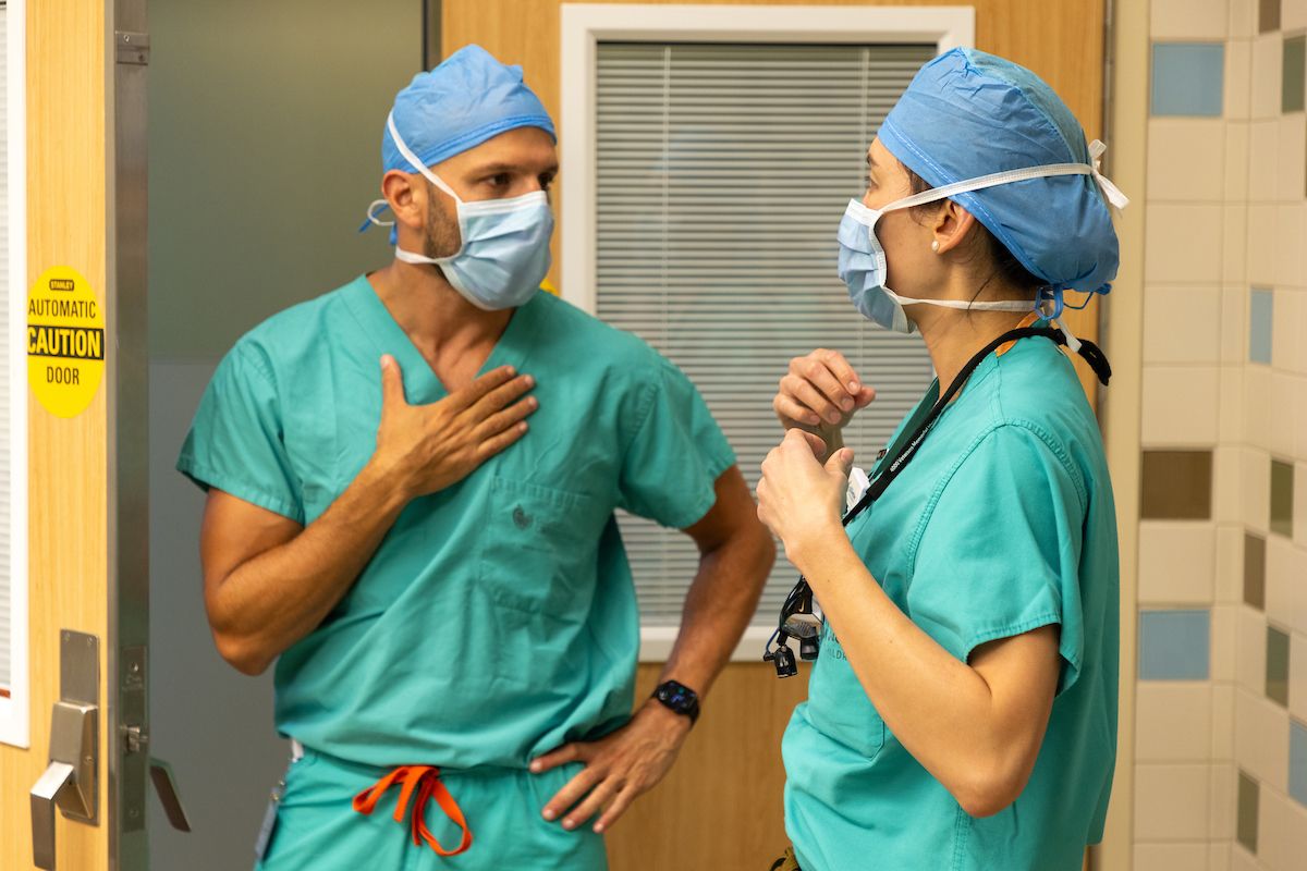 Gillette pediatric otolaryngologist, Micah Berman, MD and Dr. Barta meet outside the operating room before Ekler's cleft palate surgery and hearing test.