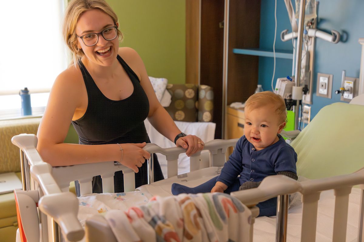 Abigail and Ekler are happy in his hospital room the morning after his cleft palate repair surgery.