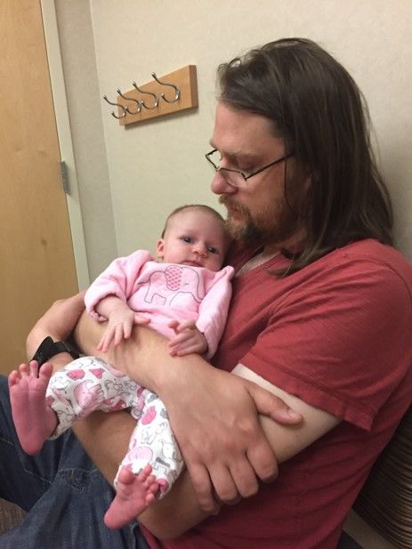 Gillette Children's SMA patient as an infant with father.